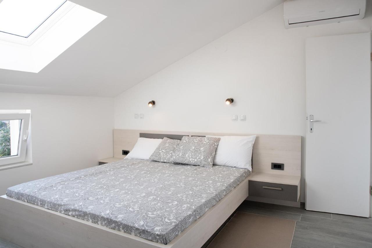 Apartmani Vrtodusic Banjol Kültér fotó