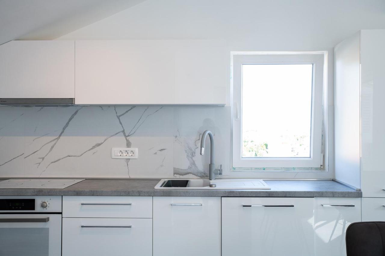 Apartmani Vrtodusic Banjol Kültér fotó