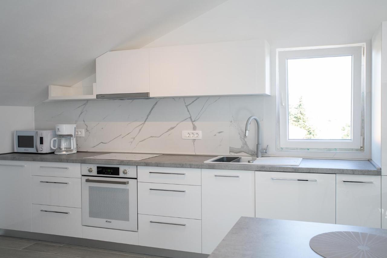 Apartmani Vrtodusic Banjol Kültér fotó