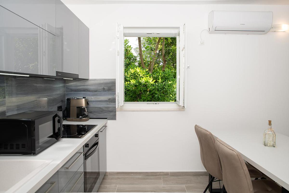 Apartmani Vrtodusic Banjol Kültér fotó