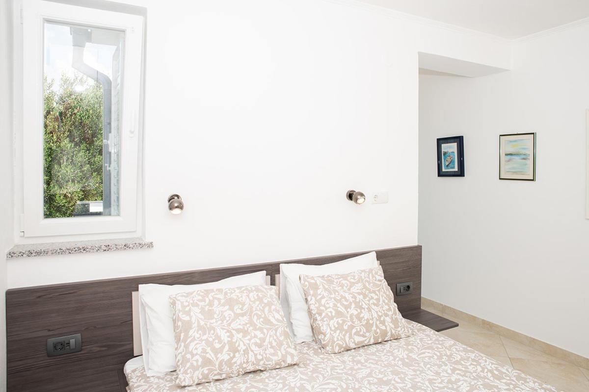 Apartmani Vrtodusic Banjol Kültér fotó