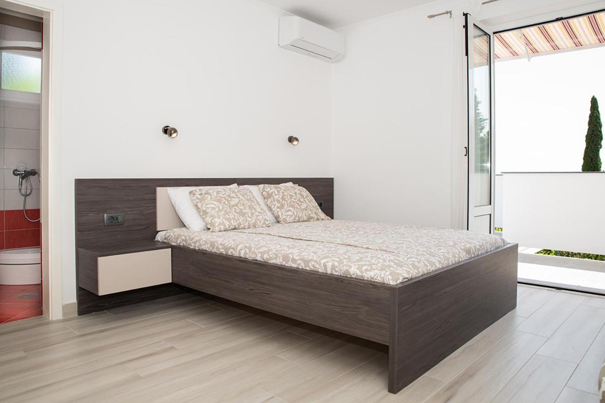Apartmani Vrtodusic Banjol Kültér fotó