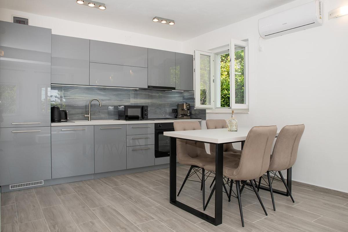 Apartmani Vrtodusic Banjol Kültér fotó