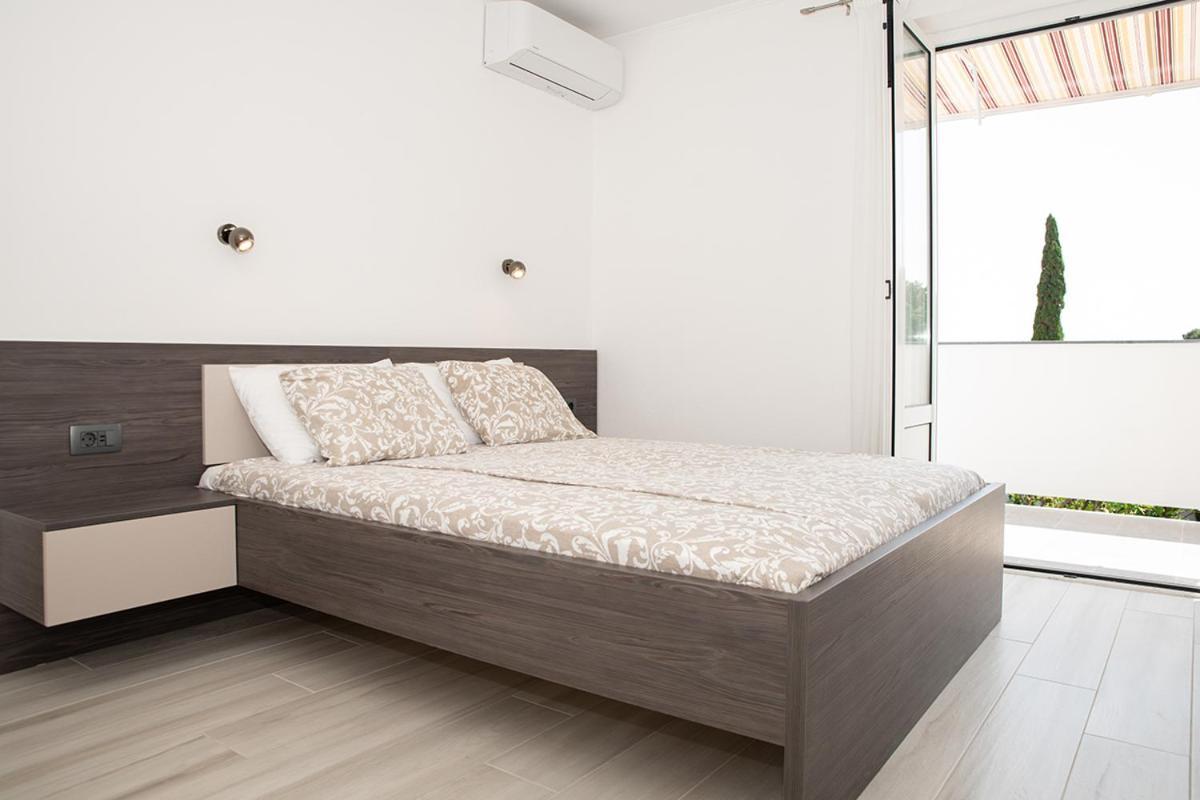 Apartmani Vrtodusic Banjol Kültér fotó