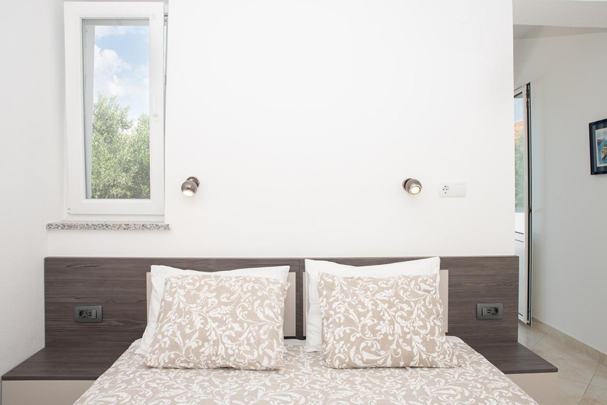 Apartmani Vrtodusic Banjol Kültér fotó