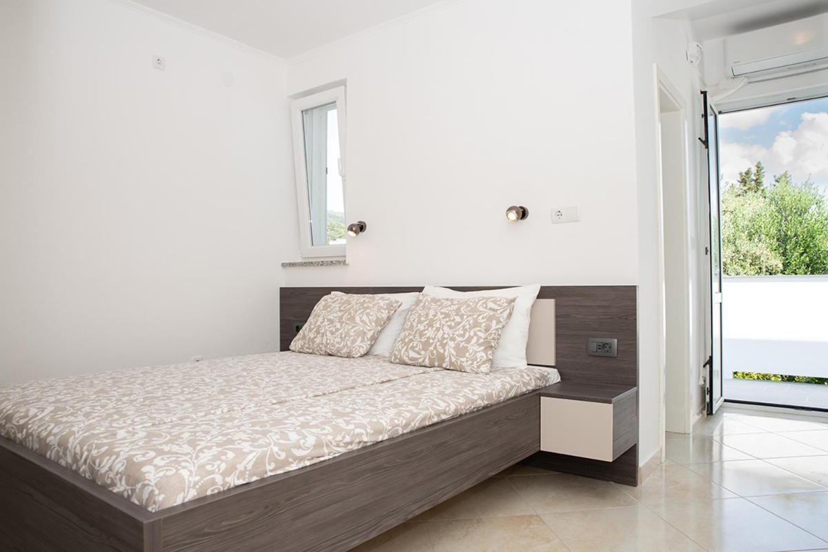 Apartmani Vrtodusic Banjol Kültér fotó